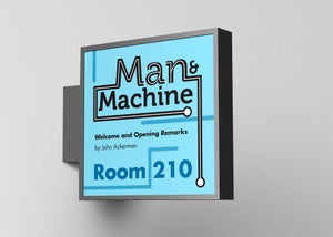 A room sign for the Man & Machine conference