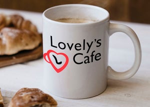 The new Lovely's Cafe logo featured on a mug