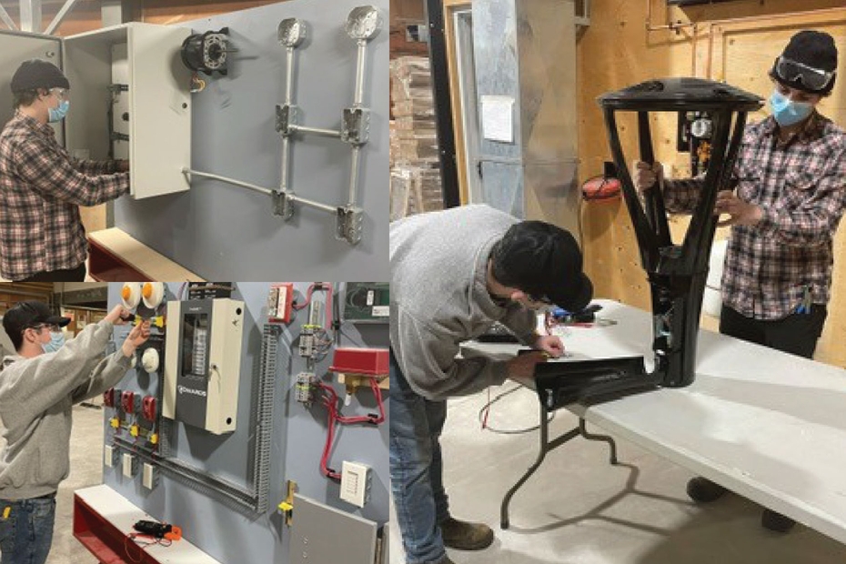 Students work in the electrical lab with donated equipment