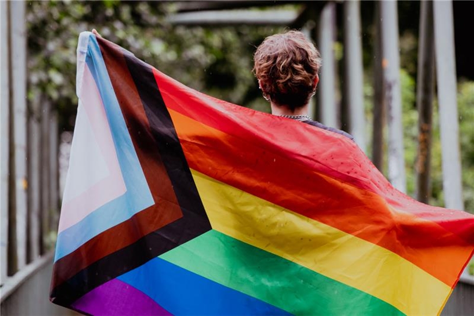 person with pride flag