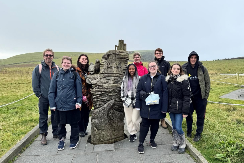 A group of students at the Cliffs of Moher in Ireland