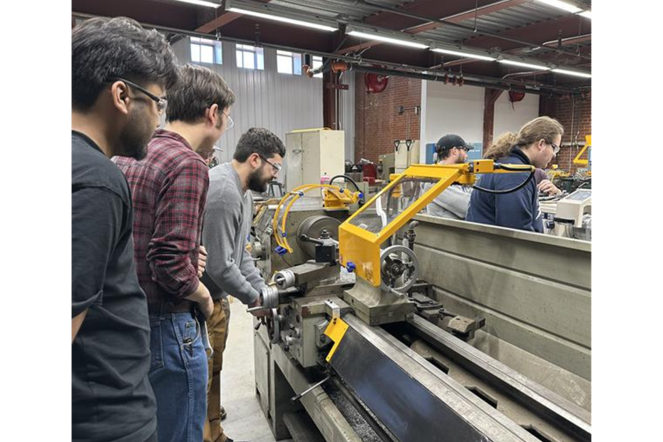 students working with machinery